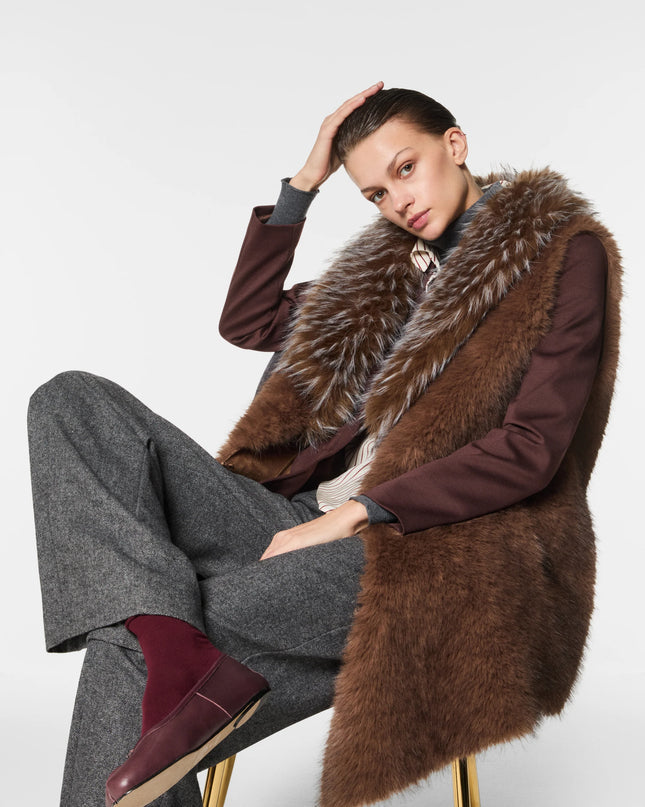 GILET PIUMA IN ECOVOLPE